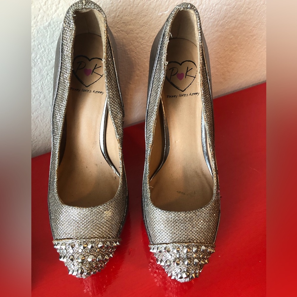 Metallic heels with spike detail.